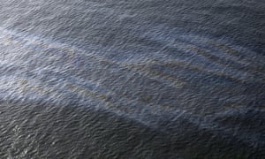 Taylor Energy oil spill<br>FILE - This March 31, 2015, file photo shows an oil sheen drifting from the site of the former Taylor Energy oil rig in the Gulf of Mexico, off the coast of Louisiana. A federal lawsuit that Taylor Energy Co. filed Thursday, Dec. 20, 2018, in New Orleans asks the court to throw out Coast Guard Capt. Kristi Luttrell’s Oct. 23 administrative order. The suit claims the Coast Guard’s actions ignored “well-verified scientific conclusions” and were taken in response to “adverse publicity.”(AP Photo/Gerald Herbert, File)