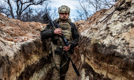 Ukrainian sniper in a trench