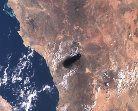 A satellite image shows smoke rising from the site of the strike on Saudi Arabia.