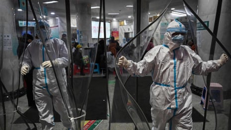 Wuhan hospitals under pressure as China says coronavirus is getting stronger – video