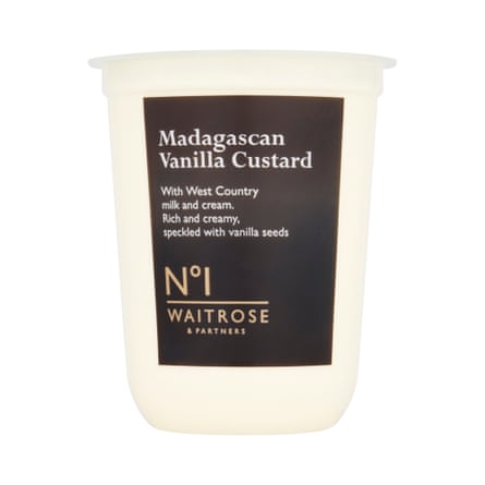 A white tub with a dark brown label reading "Madagascan Vanilla Custard" against a plain background