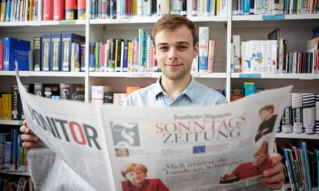 Language student George Hope at Southampton university reads a German newspaper.