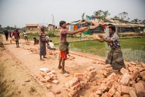 a brick road is built in the Jamtoli camp