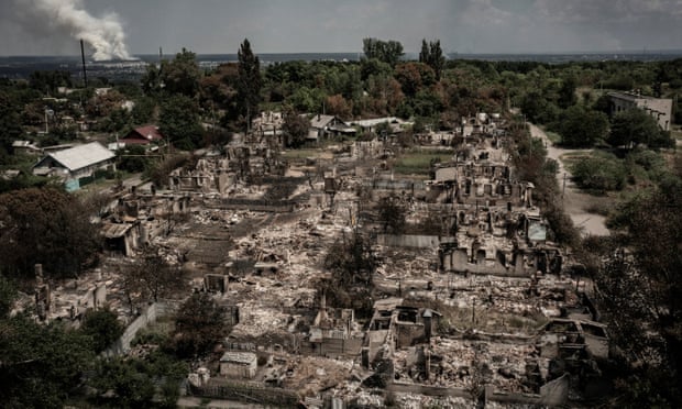 An aerial view shows destroyed houses after strike in the town of Pryvillya at the eastern Ukrainian region of Donbas.