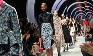 Models on the Dior autumn/winter Paris catwalk