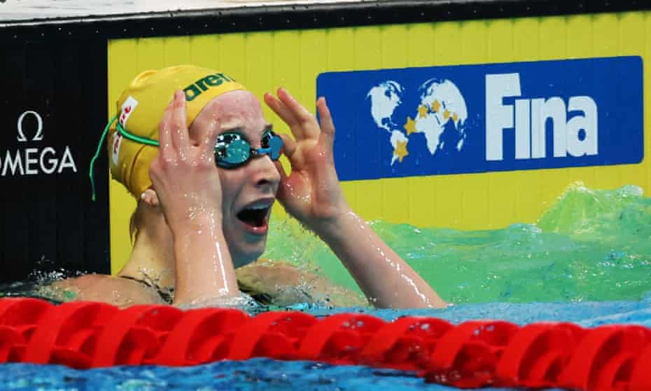 Australia's Mollie O'Callaghan celebrates after winning the women's 100m freestyle final at the swimming world championships in Budapest.