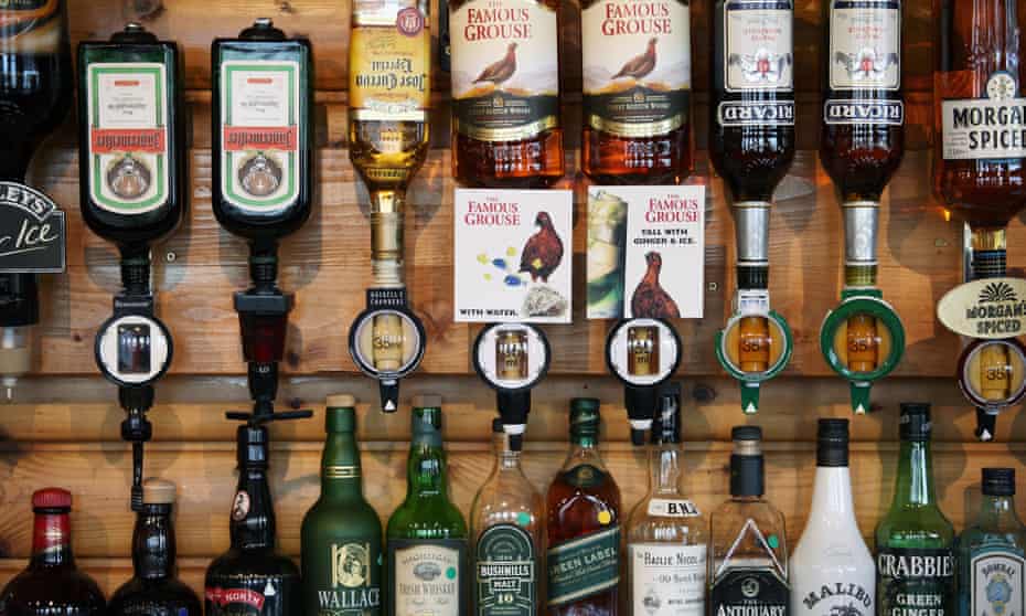 Whiskey bottles in a pub in Lochinver, Scotland