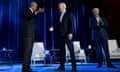 Three presidents: Barack Obama and Joe Biden shake hands as Bill Clinton claps during fundraising event at New York’s Radio City Music Hall on Thursday night.