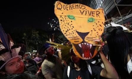 People protest for the demarcation of Indigenous land and over the murder of Dom Phillips and Bruno Pereira in São Paulo in June 2022.