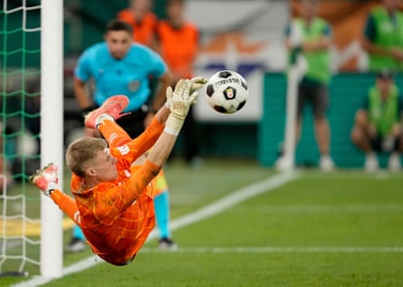 Hearts keeper Beau Reus saves a penalty from Marco Tilio to win the UEFA Conference League playoff second leg against SK Rapid.