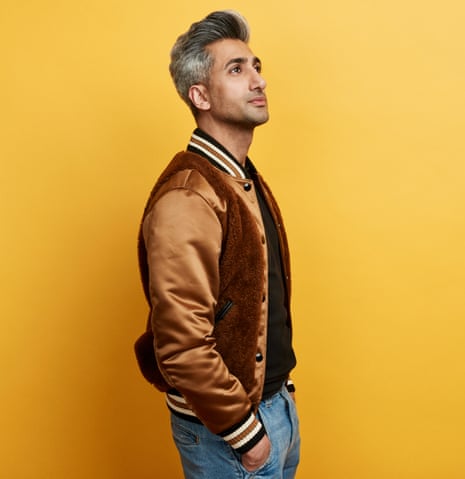 Tan France from Queer Eye, shot against a yellow background, Feb 2019