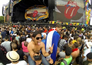 The crowd gathers for the start of the concert in the Deportiva de la Habana