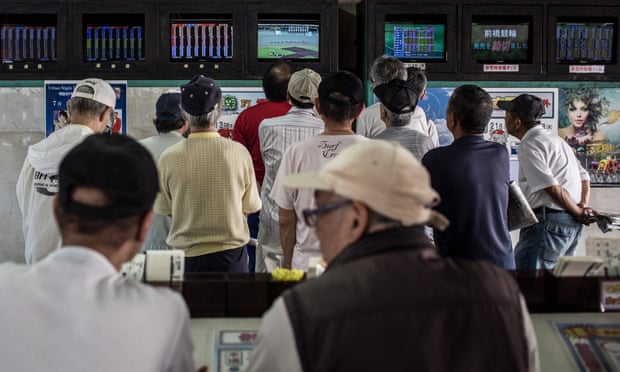 Punters watch a race on the betting screens in 2015. The races are still huge among Japan’s gambling fraternity.