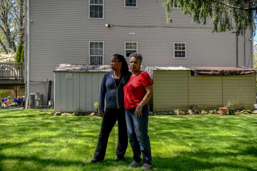 Eileen Lambert (left), 45, and her mother, Linda McNeil (right), 68, pose for a portrait outside of Ms. McNeil’s home in south Mount Vernon, New York on Friday, April 23, 2021. Ms. McNeil, a resident of Mount Vernon for 21 years, used a 16-gallon wet vacuum from September 2020 to January 2021 to suck up her toilet and tub water waste after the sewer lines in her neighborhood clogged.