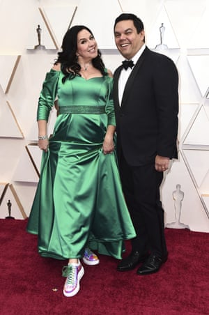Kristen Anderson-Lopez, left, and Robert Lopez arrive at the Oscars