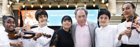 Andrew Lloyd Webber with some of the children on Music in Secondary Schools Trust programmes.