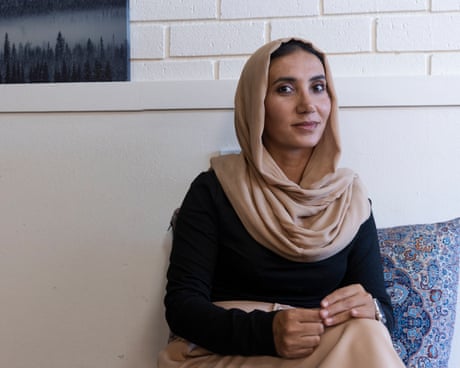 Tooba Sarwari sitting in front of a cushion