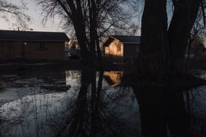 Houses made uninhabitable by the flooding in Swan Lake, South Dakota on 15 November.