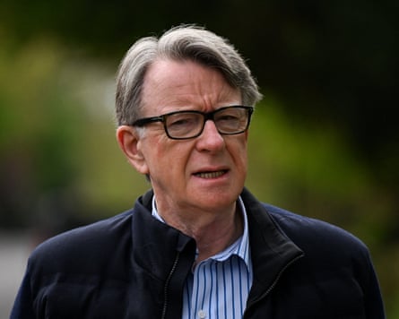 Peter Mandelson walks outside his residence in London