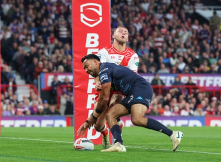 Wigan’s Bevan French drops the ball when over the try line as he is tackled by Hull KR’s Mikey Lewis.
