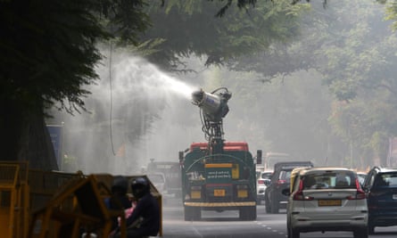 Truck with water spray on roof.