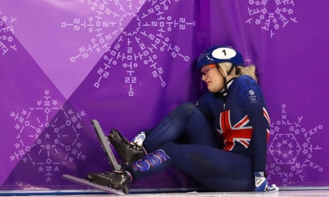Elise Christie of Great Britain crashes out during the speed skating 1,000m heats on Tuesday.