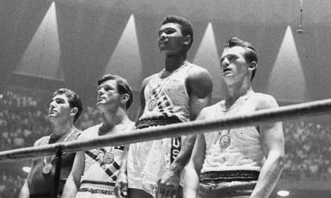 1960s Olympic light-heavyweight medal winners Cassius Clay, centre right, Zbigniew Pietrzykowski, far right, Giulio Saraudi of Italy and Anthony Madigan of Australia, who both took bronze. 
