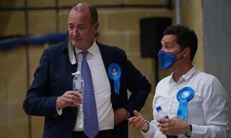 Defeated Conservative candidate Peter Fleet (left) after the byelection declaration at Chesham leisure centre.