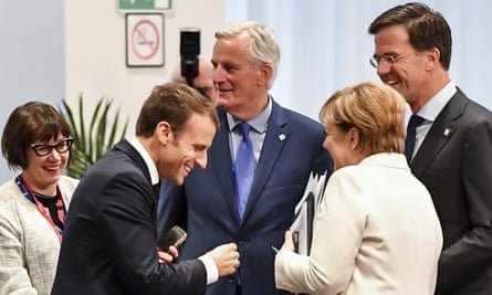 Emmanuel Macron speaking with Angela Merkel, Mark Rutte and Michel Barnier