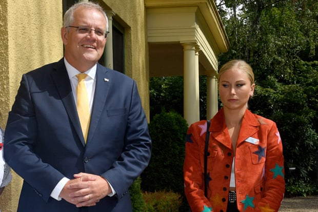 Scott Morrison and Grace Tame during a morning tea for state and territory recipients in the 2022 Australian of the Year awards.