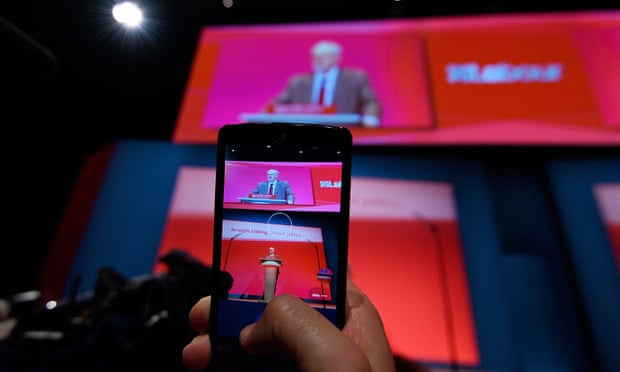 A supporter films Jeremy Corbyn at the Labour party conference 2015
