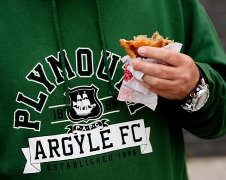 A Plymouth fan and his pasty.