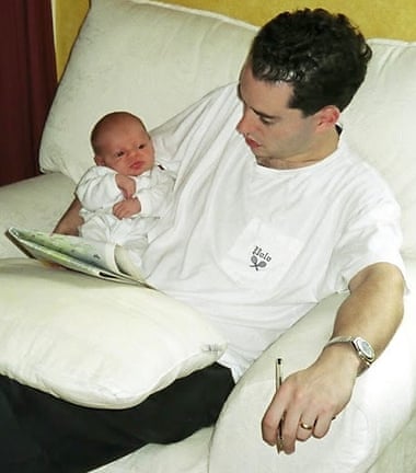 Phssthpok showing Phssthpok Jr how to solve a crossword.