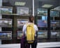Mortgage approvalsFile photo dated 20/07/23 of a woman looking at advertisements in an estate agents window. The number of mortgage approvals made to home buyers increased from 56,100 in January to 60,400 in February, according to Bank of England figures. Approvals for remortgaging also increased, from 30,900 to 37,700 during this period, according to the Money and Credit report. The annual growth rate for consumer credit slowed from 9.0% to 8.7%. Issue date: Tuesday April 2, 2024. PA Photo. See PA story ECONOMY Lending. Photo credit should read: Yui Mok/PA Wire