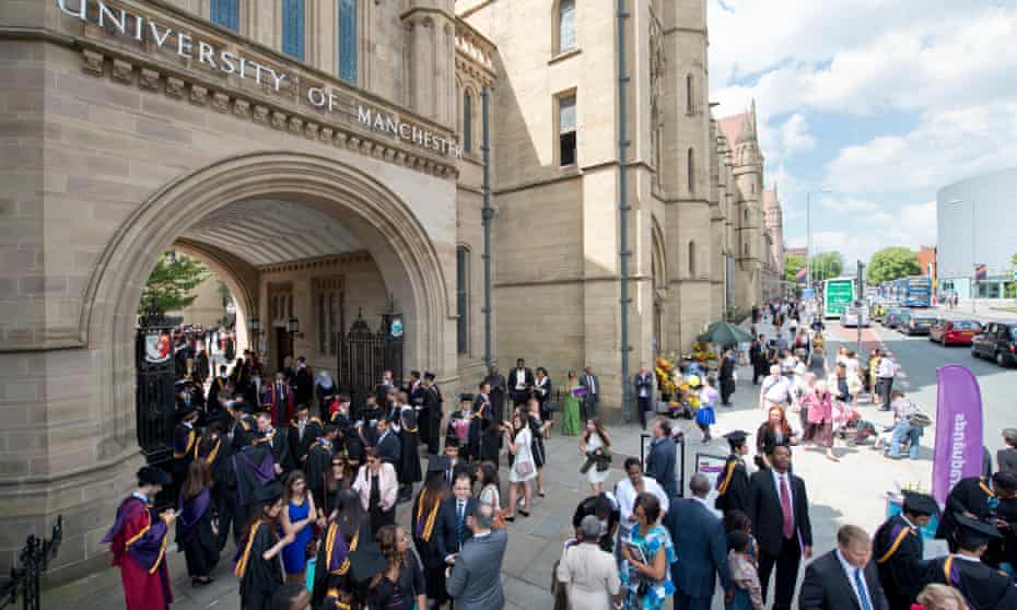 Manchester University students attend their graduation ceremony