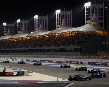 Drivers line up behind a safety car at the Bahrain Grand Prix last April