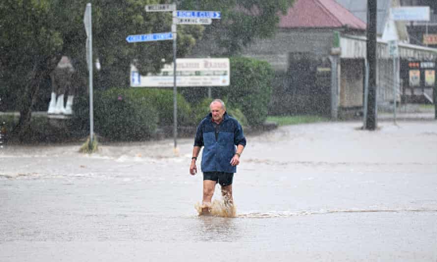 Severe Rain In Queensland Threatens CommunitiesLAIDLEY, AUSTRALIA - MAY 13: A man walks through floodwater on May 13, 2022 in Laidley, Australia. Parts of southeast Queensland are on flood watch as the state continues to experience heavy rainfall. (Photo by Dan Peled/Getty Images)