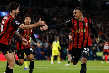 Eli Kroupi (right) is congratulated by Marcos Senesi after making it 2-1 to Bournemouth