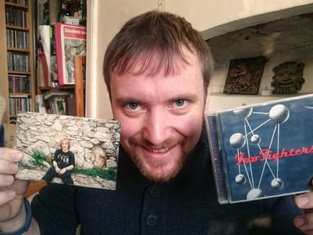 James Eaton with a photo of his 1997 self and Foo Fighters’ second album.