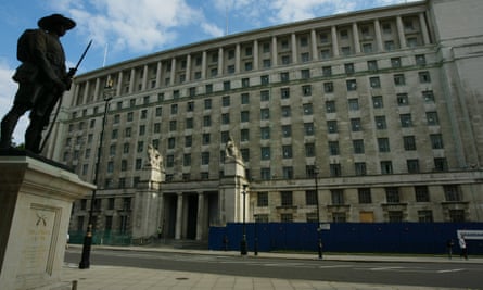 Ministry of Defence building in Whitehall with London Anzac statue to left.