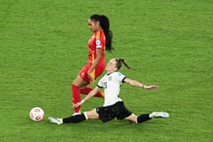 Germany’s Sophia Kleinherne (right) hurts herself arsenic she makes a last-ditch tackle connected Spain’s Salma Paralluelo