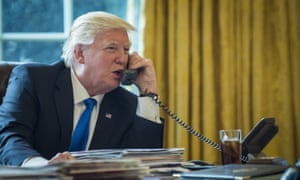 Donald Trump speaks with Vladimir Putin in the Oval Office on 28 January.