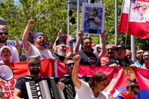 Supporters of Serbian tennis player Novak Djokovic rally outside the Federal Court of Australia, on 10 January.
