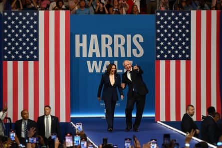 Harris and Walz greet their rally audience in Philadelphia.