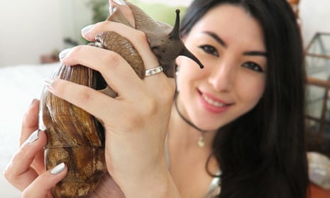 Emma Jacobs with a giant snail
