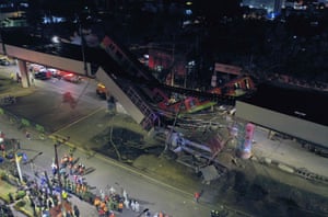 Hundreds of police officers and firefighters cordoned off the scene as desperate friends and relatives of people believed to be on the trains gathered outside the security perimeter