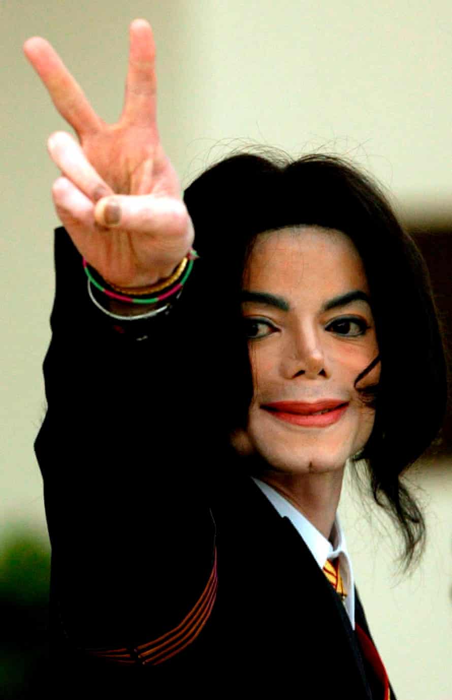 ‘We wanted to make history’: Michael Jackson’s bizarre year in Bahrain | Michael Jackson 1 Jackson acknowledges fans as he arrives at court in Santa Barbara, 2005.