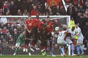 Manchester United players jump to block a free kick from West Ham’s Manuel Lanzini.