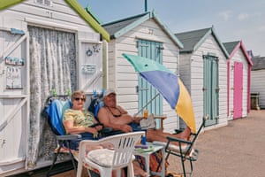 Brian and Christine outside their beach hut at Goodrington Sands