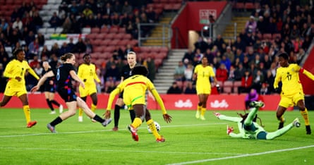 Lucia Kendall scores a goal for England against Ghana